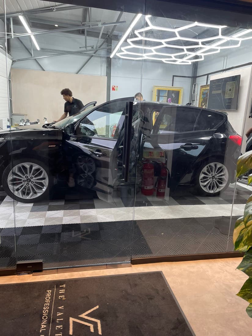 The Valet Club team valeting a car at the Bradley Stoke studio