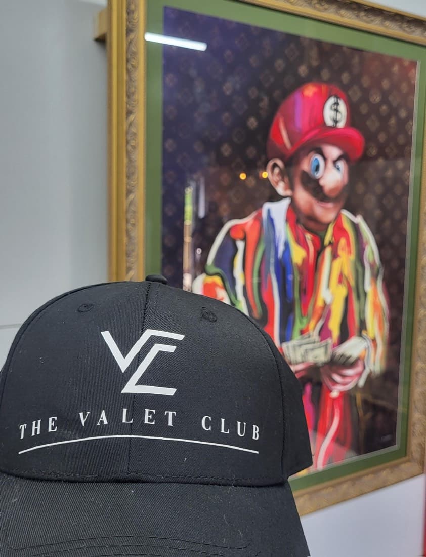 The Valet Club branded cap at the Bradley Stoke studio